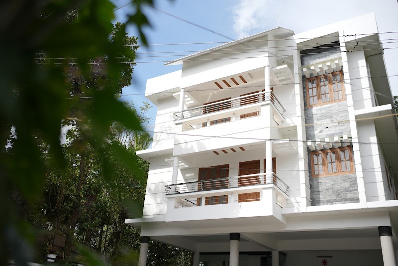 WHITE PORTICO THEKKADY