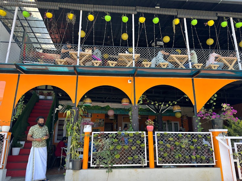 TUSKER CAF'E | Restaurant | Thekkady